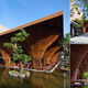 Illustration for article titled This Soaring Openair Cafe Is Made From Giant Bamboo Fishing Baskets